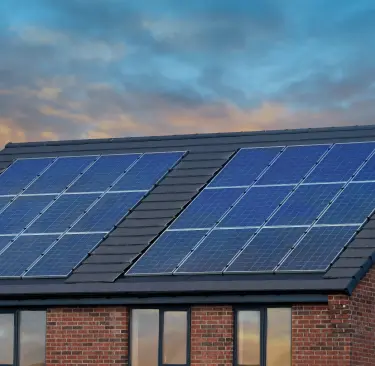 Solar panels generating electricity on a cloudy day