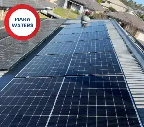 Roof with newly installed solar panels, showing a clean and professional setup.